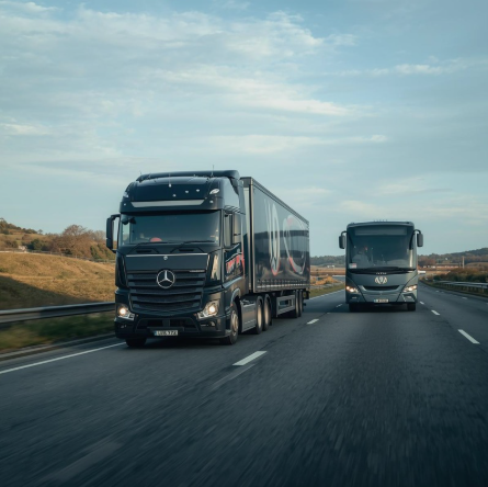 lorry and bus out on the road